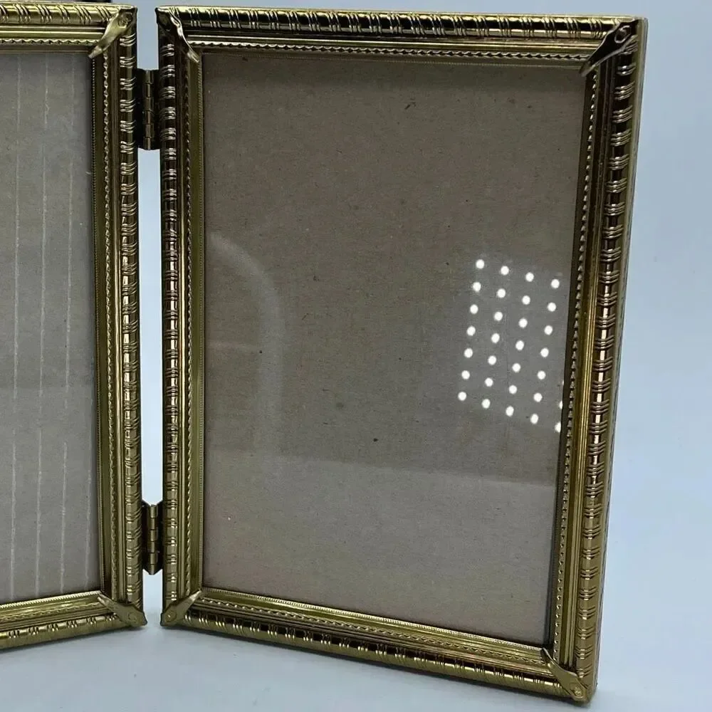 Vintage gold tone hinged double 5 X 7 frames